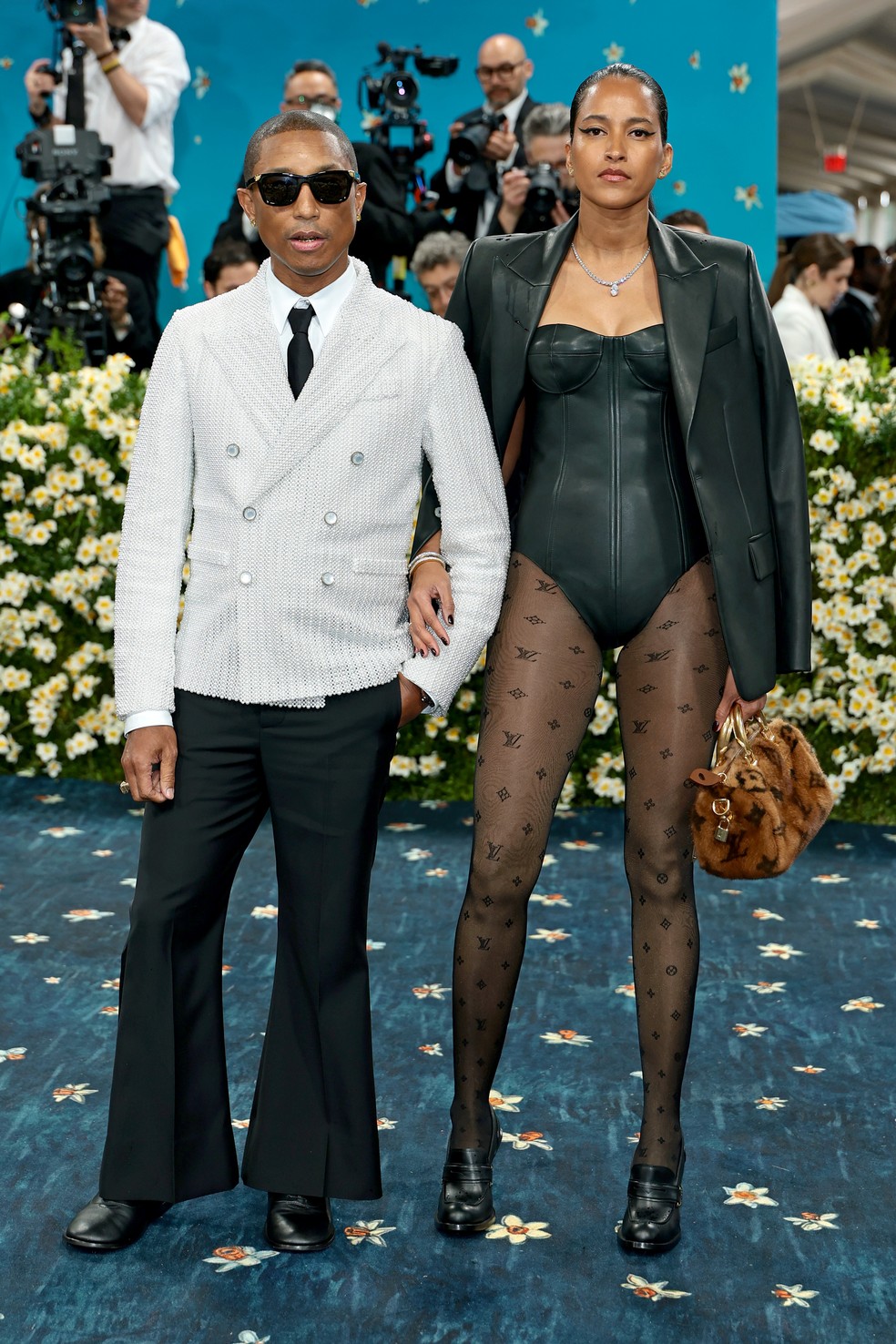 Pharrell Williams e Helen Lasichanh — Foto: Getty Images