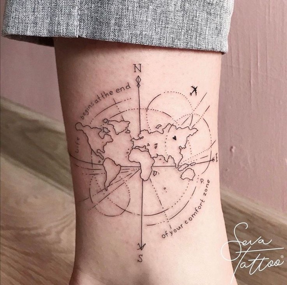 Perna: Uma flecha atravessando um mapa-múndi, simbolizando aventura. — Foto: Reprodução/Pinterest