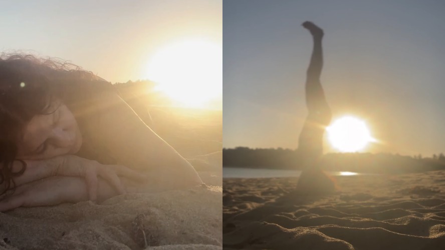 Mulher fazendo yoga na praia