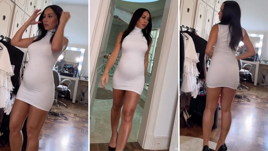 Sabrina Sato desfila de tubinho branco e mostra barriguinha saliente